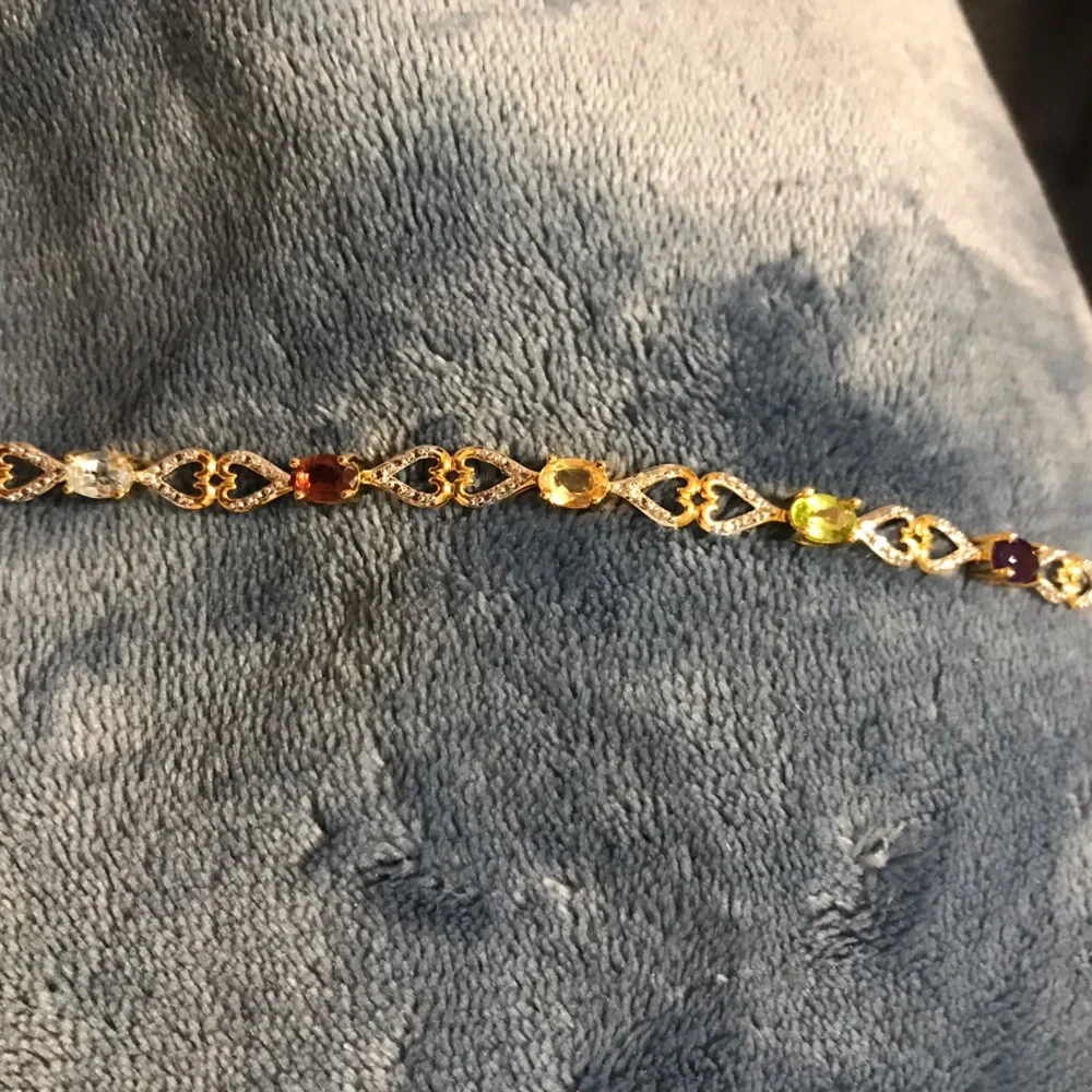 Gorgeous 18kt Gold over Sterling Silver with Genuine Stones and Diamond accents. - Picture 8 of 9